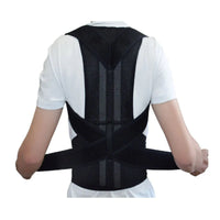 Person wearing a black posture corrector on a white background
