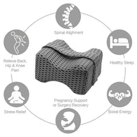 Gray ergonomic pillow with health benefits icons on a white background