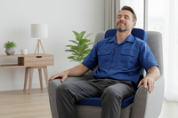 Man relaxing in a chair in a home setting