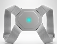 Gray Posture corrector device with a glowing green button o